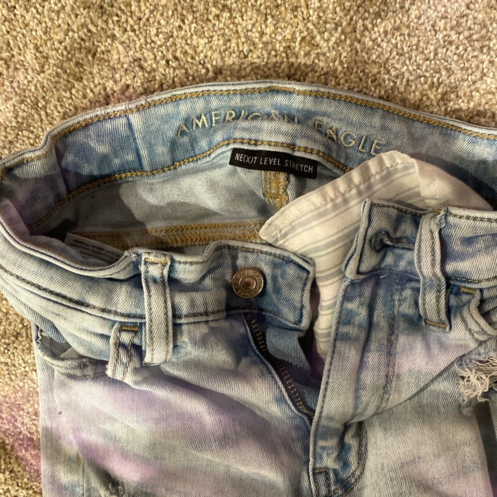 ripped light blue jeana